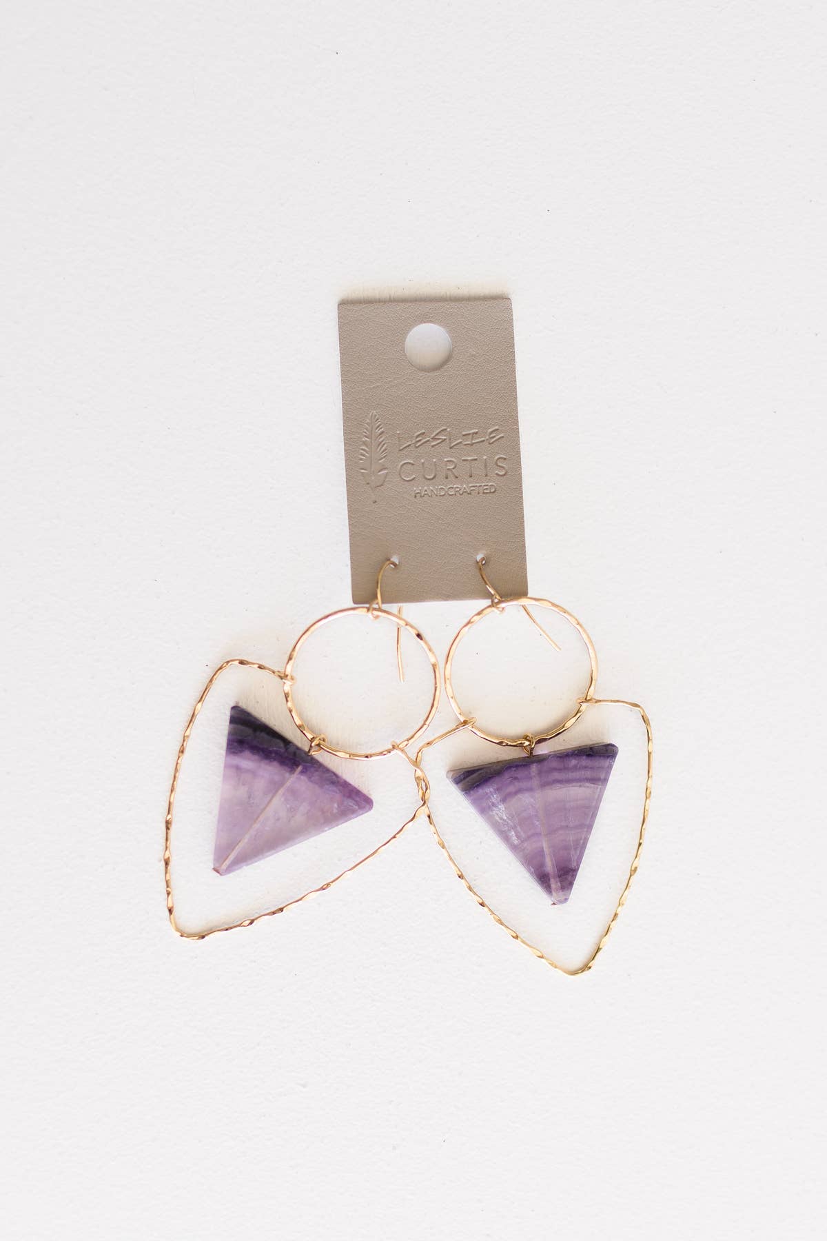 Leslie Curtis - 0626 Codi - Hammered gold geometric with amethyst stone 2.5"